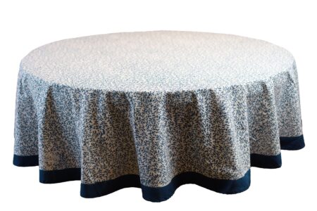 Blue print round 72-inch table cloth on a dining table